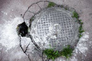 Broken Manhole Cover